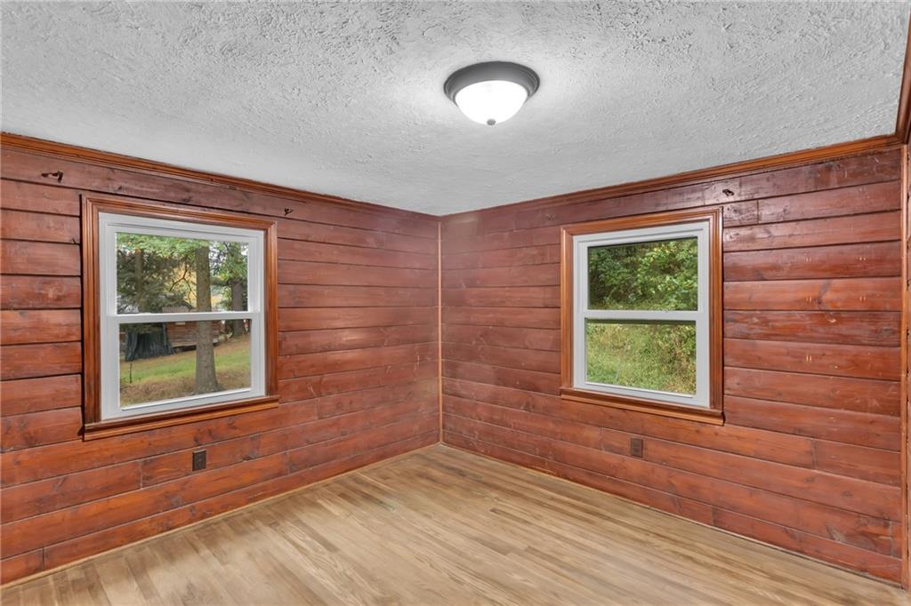 155 Harrold Street Jeannette, PA 15644 - Photo 26 of 37 an empty room with windows