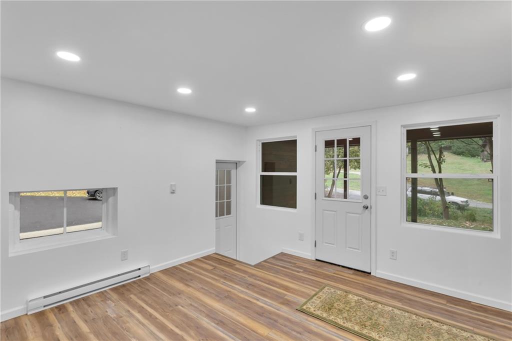 155 Harrold Street Jeannette, PA 15644 - Photo 31 of 37 a view of empty room with window and ceiling fan