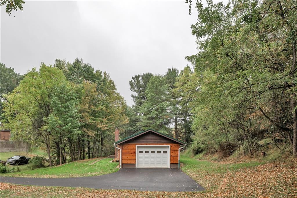 155 Harrold Street Jeannette, PA 15644 - Photo 35 of 37 a view of a pathway in a park with large trees