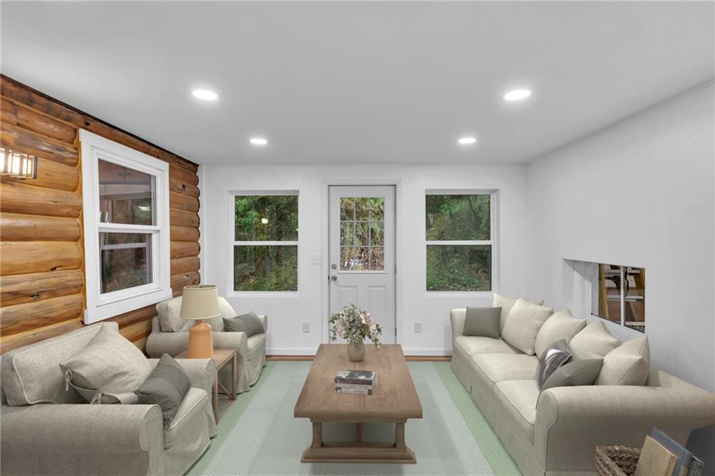 155 Harrold Street Jeannette, PA 15644 - Photo 6 of 37 a living room with furniture and windows