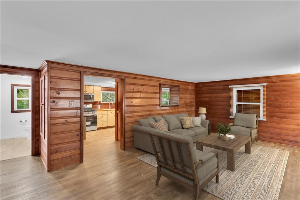 155 Harrold Street Jeannette, PA 15644 - Photo 8 of 37 a living room with furniture and wooden floor