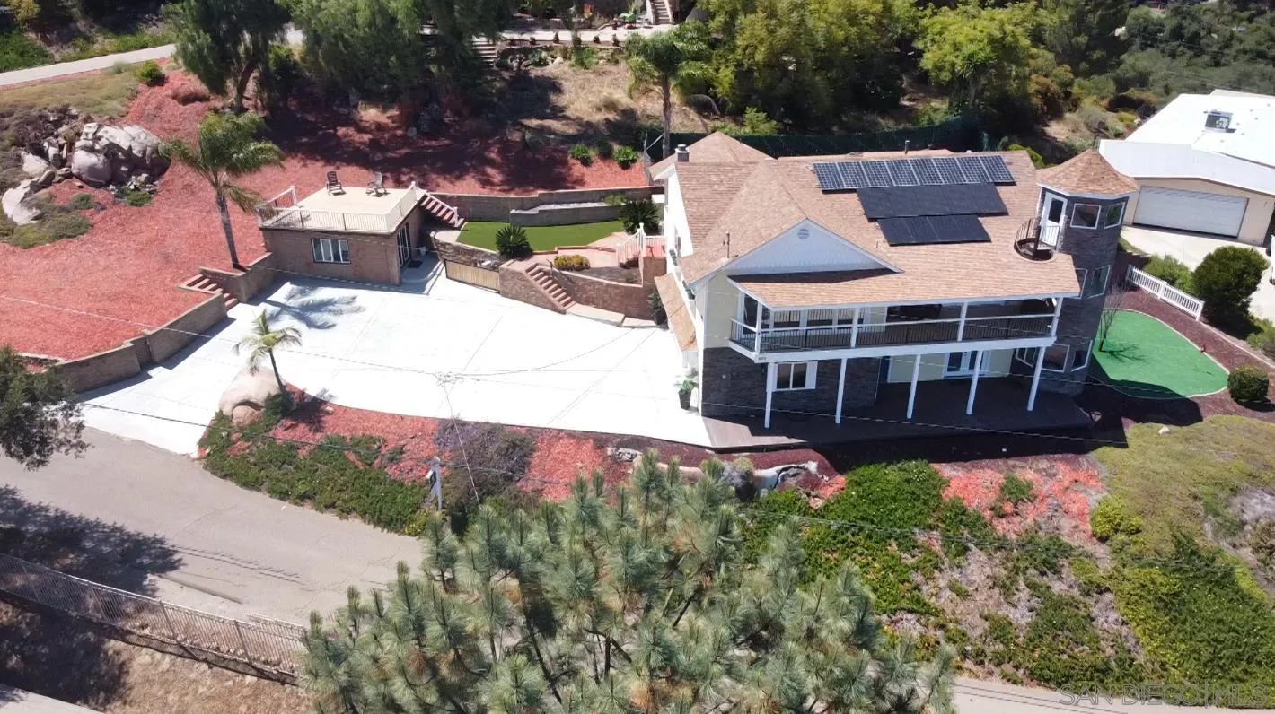 205 Highline Trail El Cajon, CA 92021 - Photo 3 of 45 an aerial view of a house with a yard