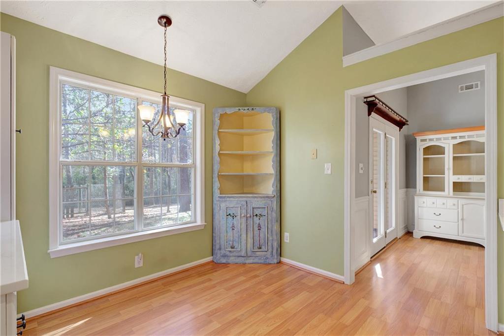 7 Buck Trail Newnan, GA 30265 - Photo 12 of 37 a view of a room with wooden floor and windows