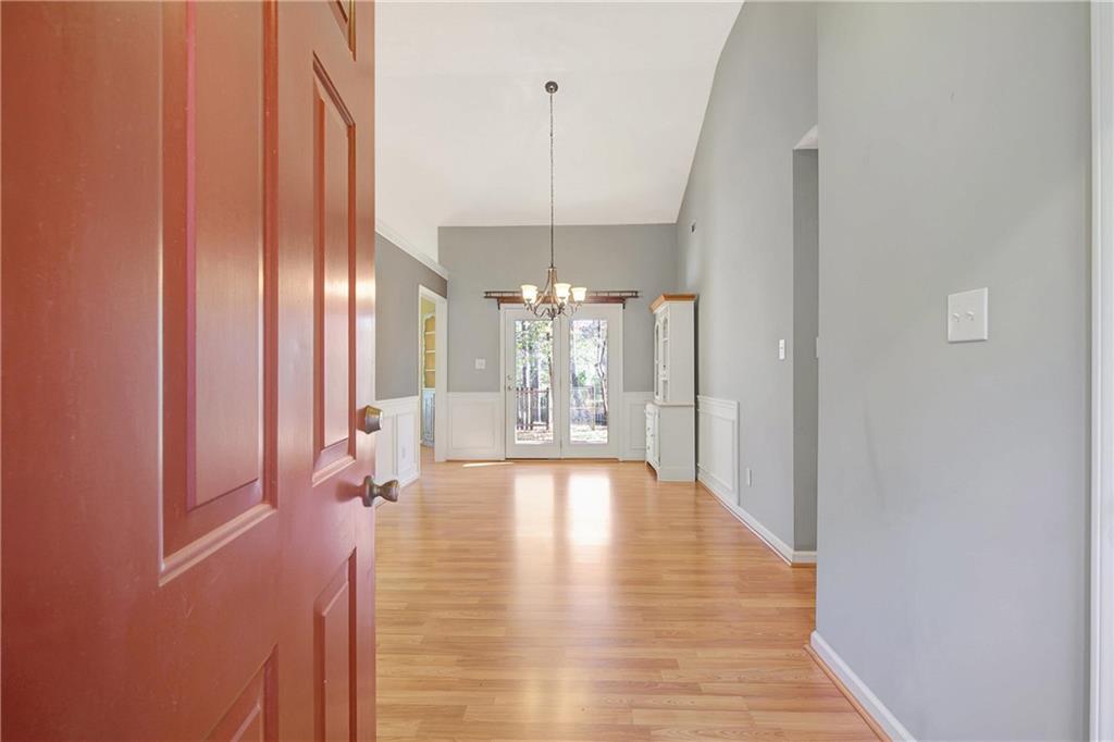 7 Buck Trail Newnan, GA 30265 - Photo 2 of 37 a view of an entryway with wooden floor