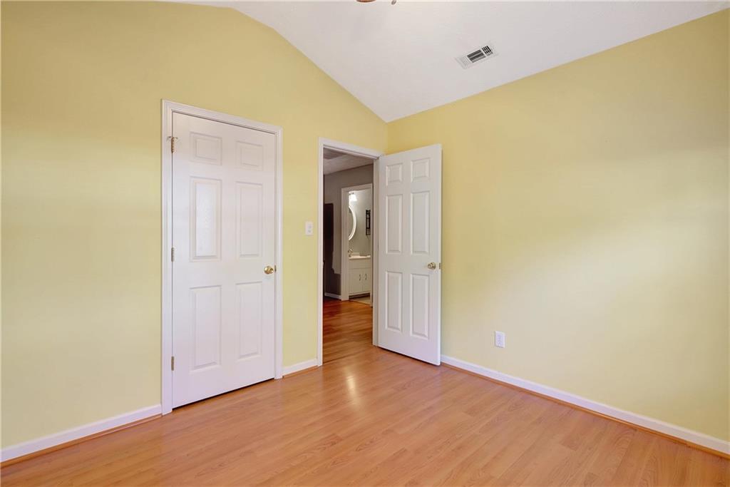 7 Buck Trail Newnan, GA 30265 - Photo 29 of 37 a view of an empty room with wooden floor