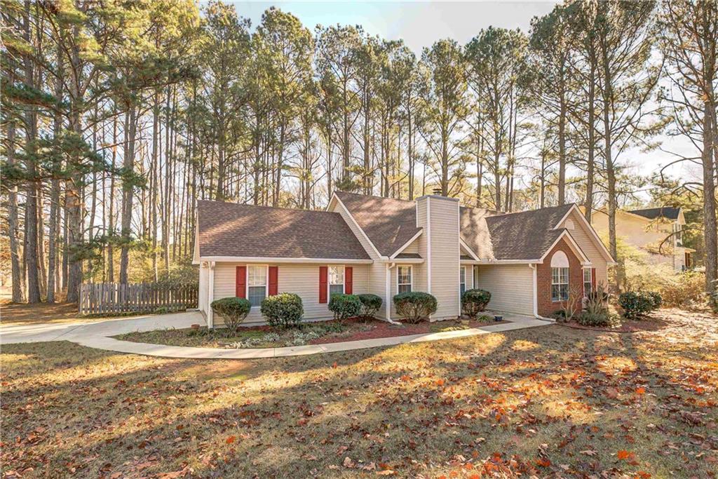 7 Buck Trail Newnan, GA 30265 - Photo 30 of 37 a front view of a house with a yard