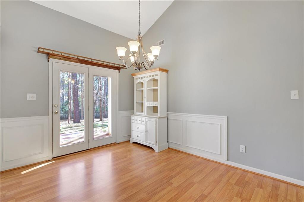 7 Buck Trail Newnan, GA 30265 - Photo 8 of 37 a view of a livingroom with wooden floor closet and windows