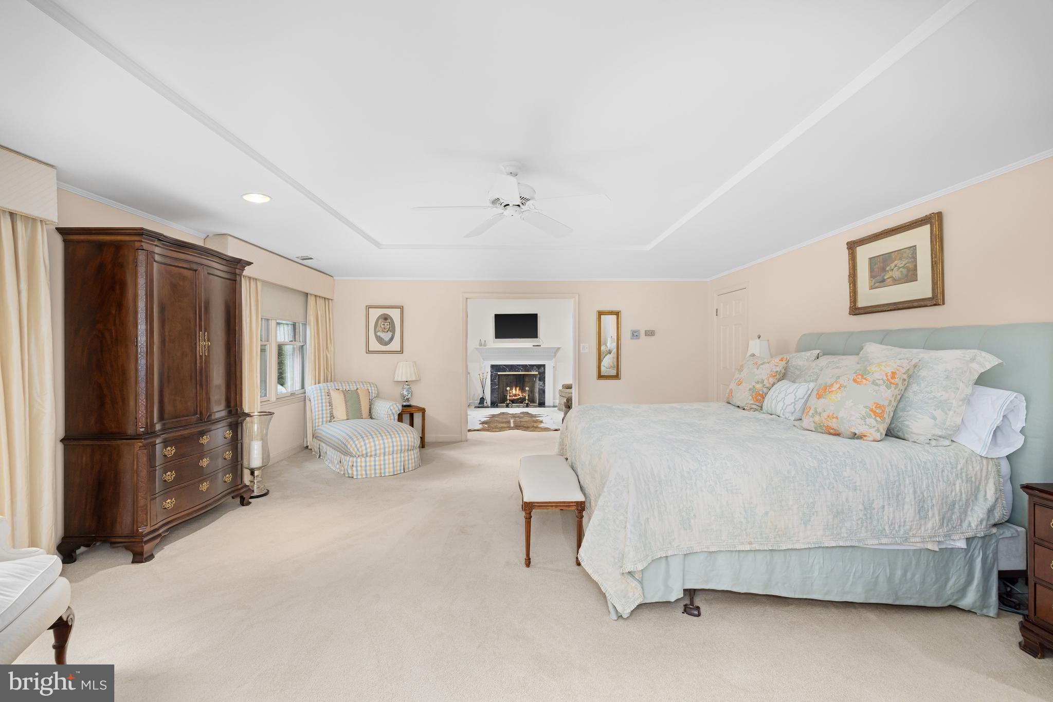 1332 Skipwith Road McLean, VA 22101 - Photo 11 of 35 a spacious bedroom with a bed and a refrigerator