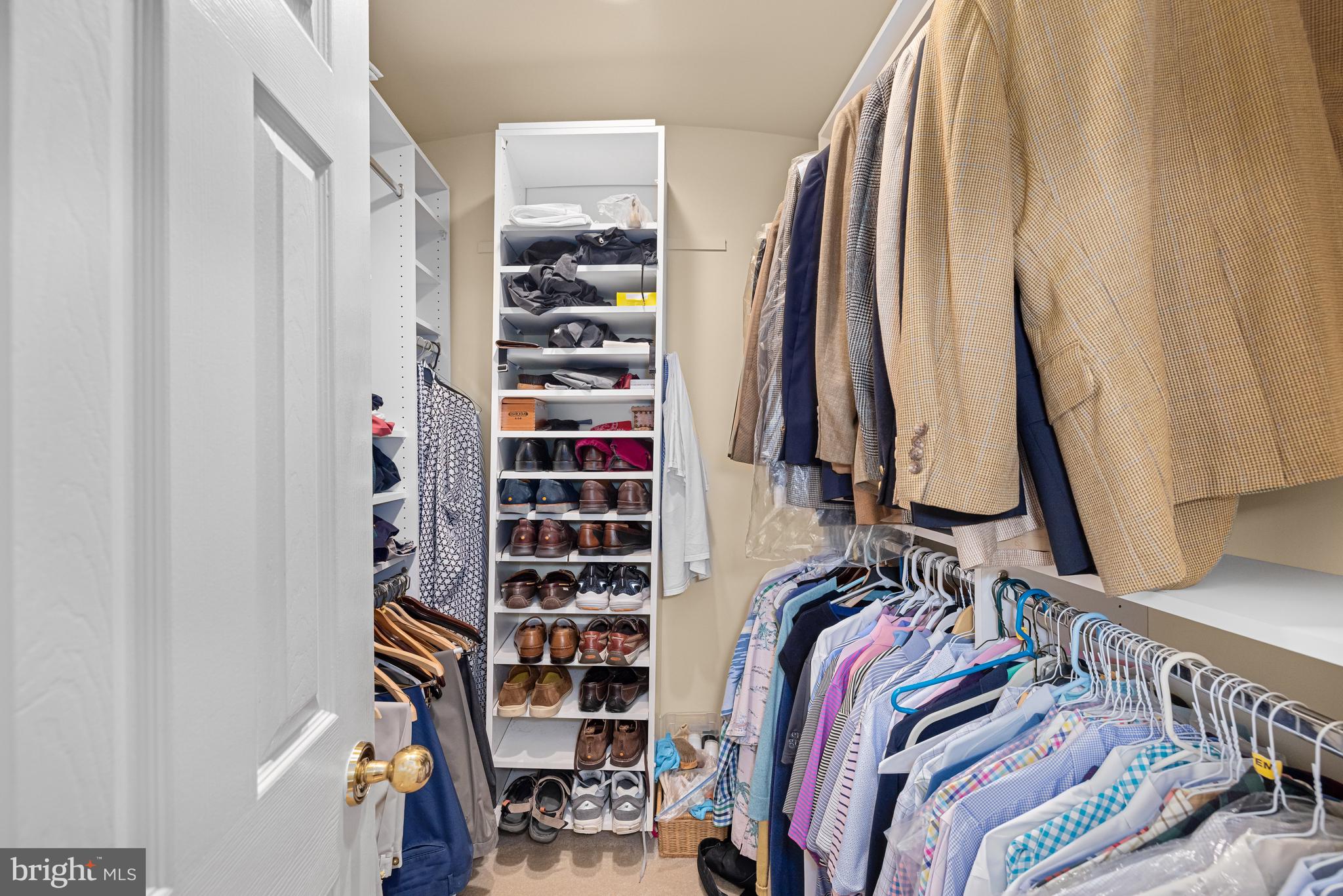 1332 Skipwith Road McLean, VA 22101 - Photo 15 of 35 a view of walk in closet with clothes and shoes