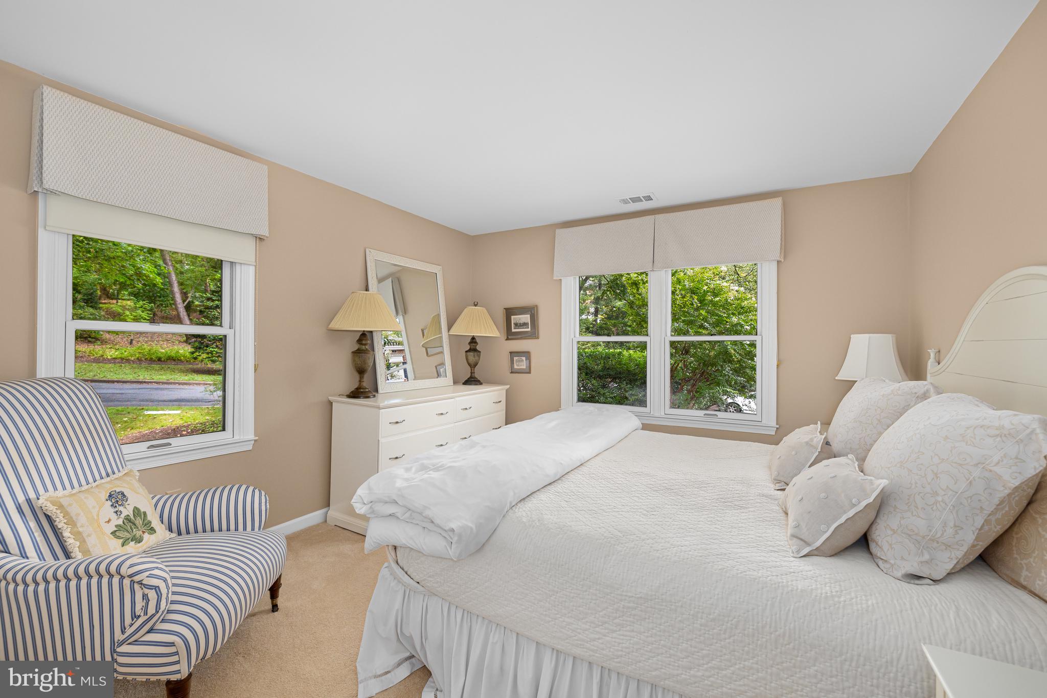 1332 Skipwith Road McLean, VA 22101 - Photo 17 of 35 a bedroom with a bed and a couch