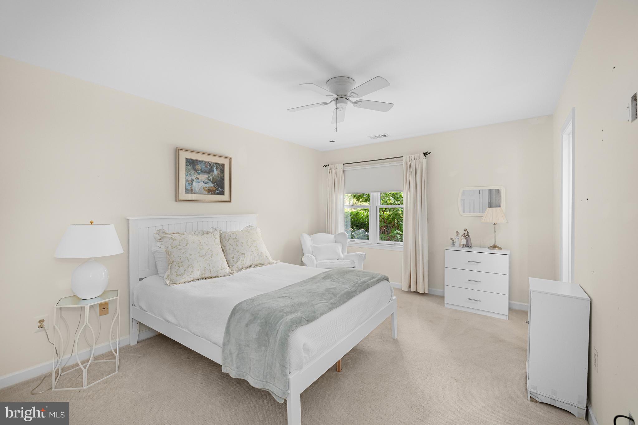 1332 Skipwith Road McLean, VA 22101 - Photo 20 of 35 a bedroom with a white bed and white walls