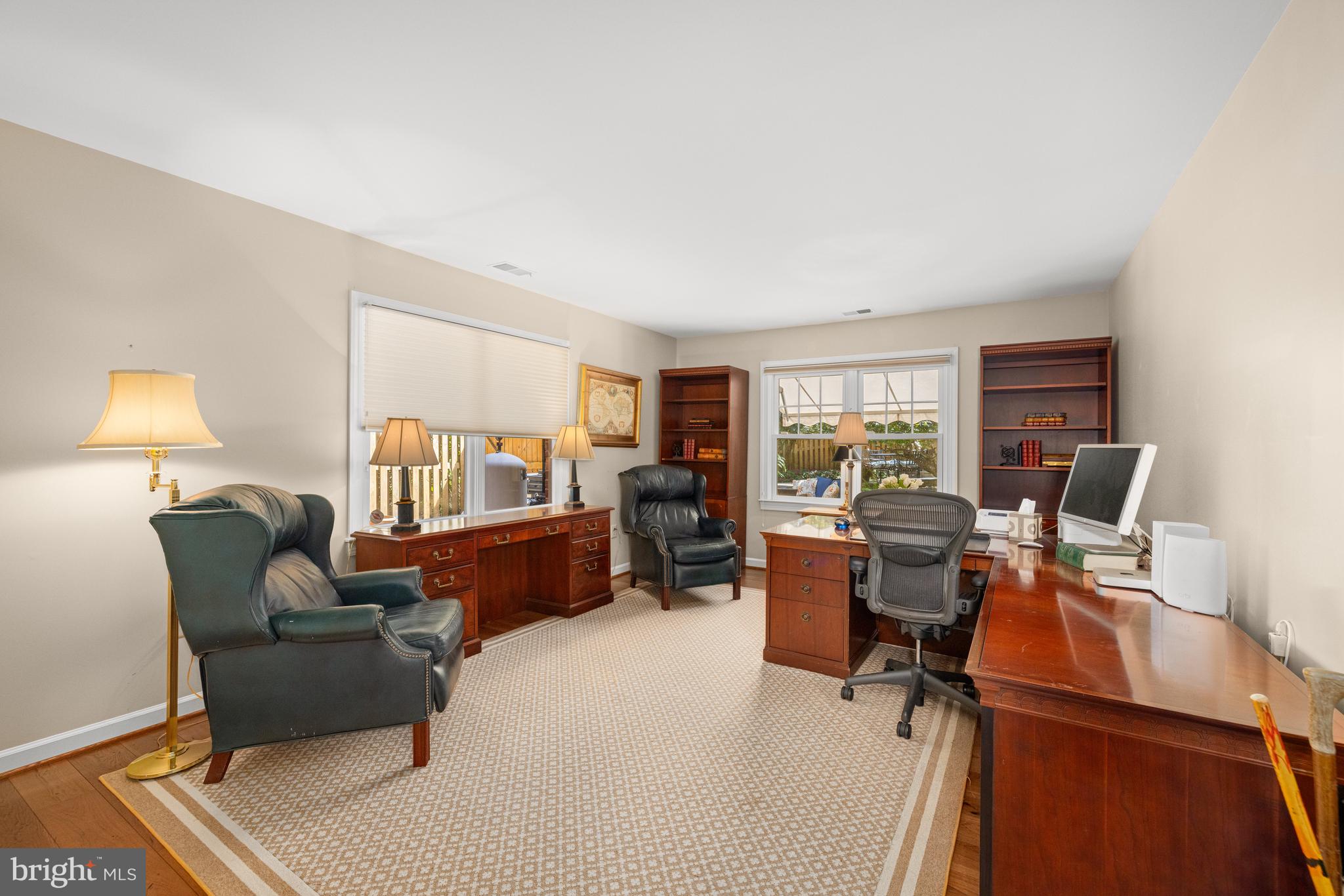 1332 Skipwith Road McLean, VA 22101 - Photo 26 of 35 a bedroom with furniture and a wooden floor