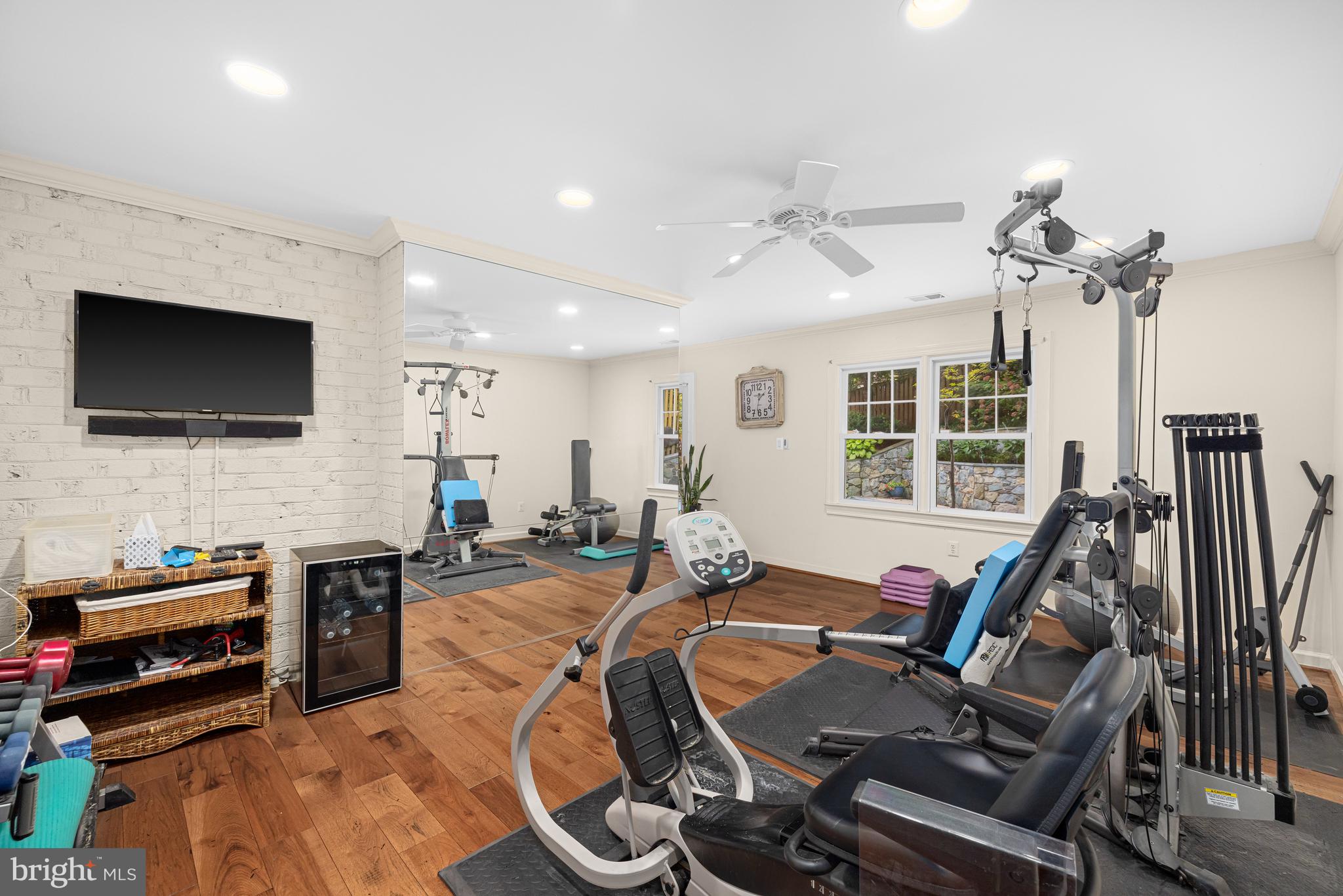 1332 Skipwith Road McLean, VA 22101 - Photo 27 of 35 a living room with furniture a flat screen tv and a window