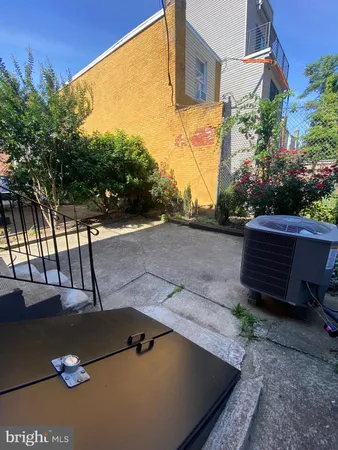 a view of a back yard of the house