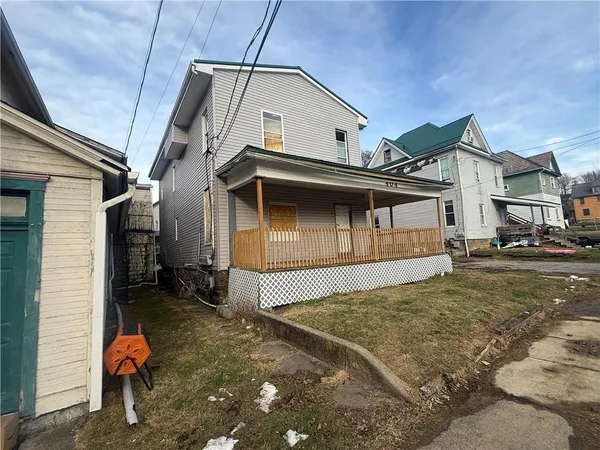 a view of a house with a patio