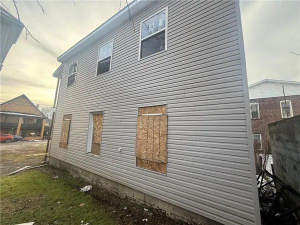 a view of a backyard of a house