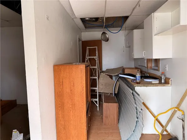 a view of a kitchen with a kitchen
