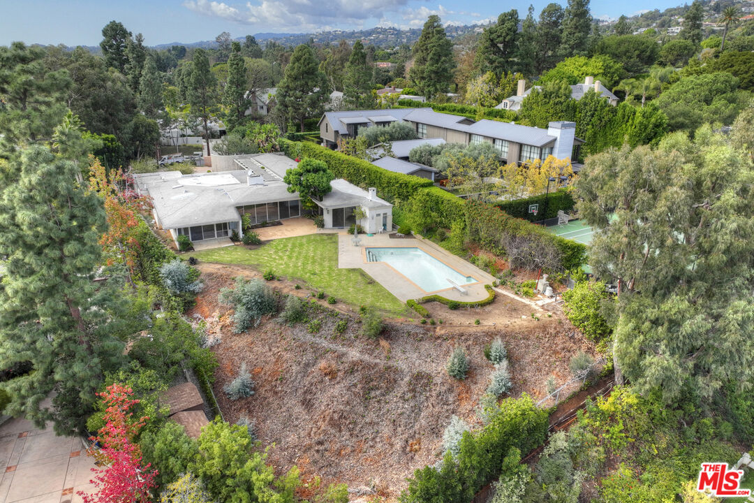 938 North Alpine Drive Beverly Hills, CA 90210 - Photo 3 of 11 an aerial view of a house with a yard