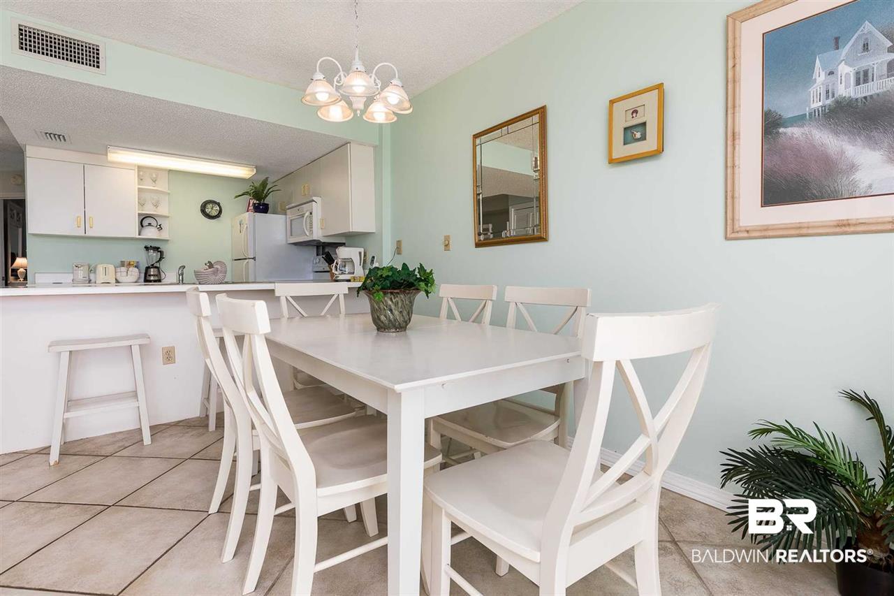 645 Plantation Road, Unit 6406 Gulf Shores, AL 36542 - Photo 8 of 28 Dining to Kitchen