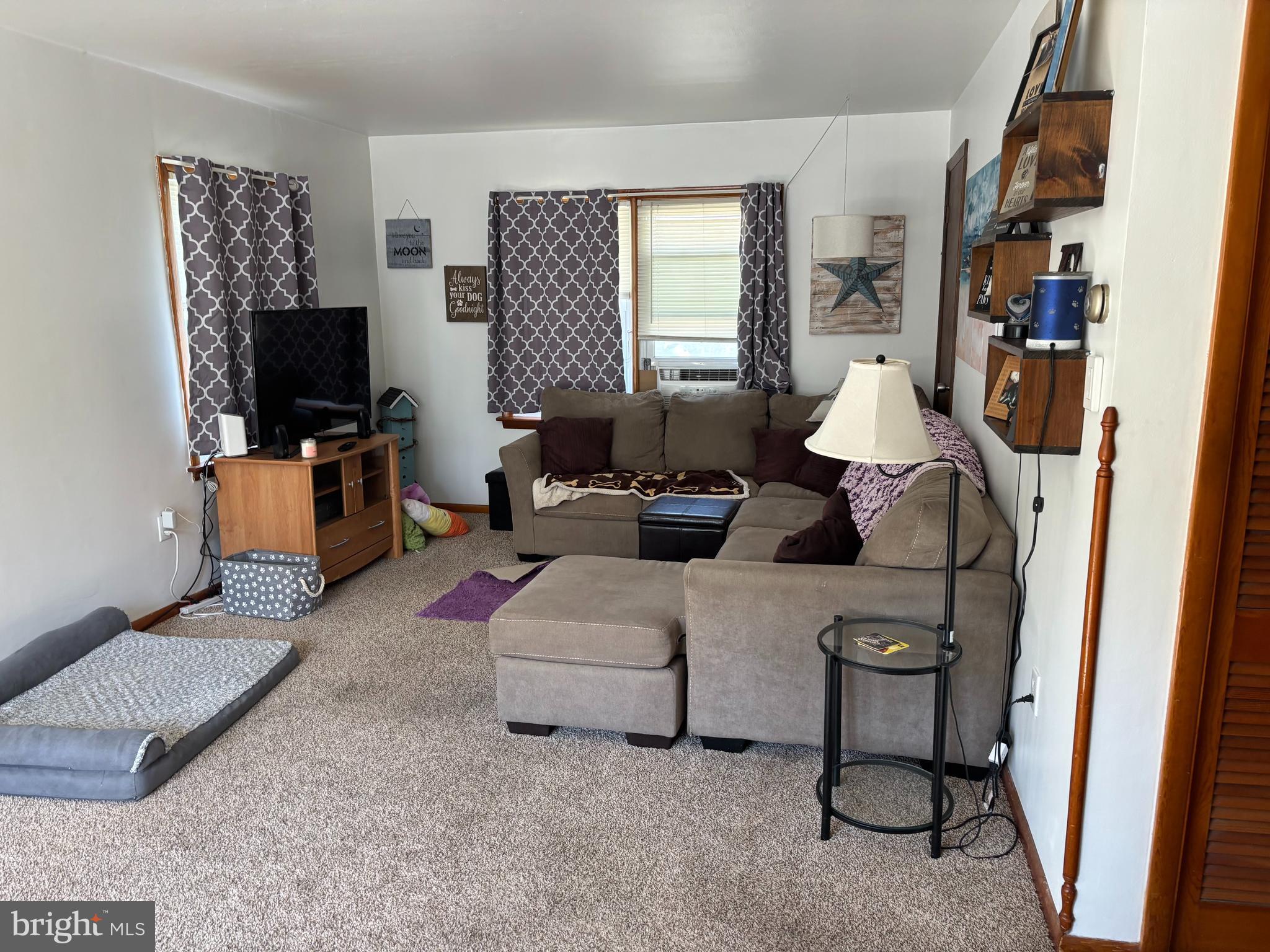 219 North 3rd Street Hanover, PA 17331 - Photo 11 of 12 a living room with furniture and a flat screen tv
