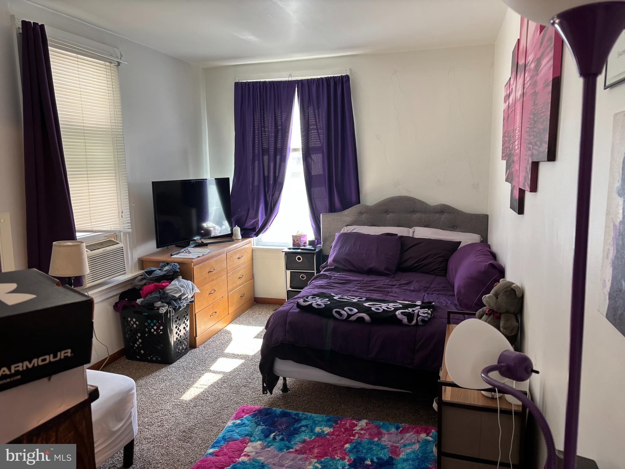 219 North 3rd Street Hanover, PA 17331 - Photo 7 of 12 a bedroom with a bed and a window