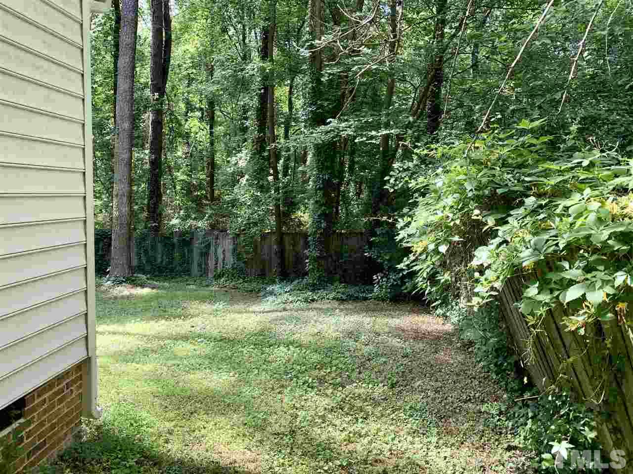 5121 Vann Street Raleigh, NC 27606 - Photo 12 of 12 a view of outdoor space and yard