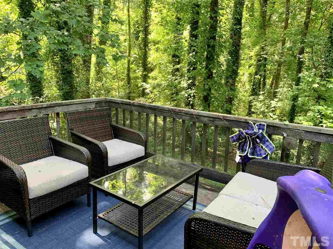 5121 Vann Street Raleigh, NC 27606 - Photo 6 of 12 a view of a two chairs in the deck