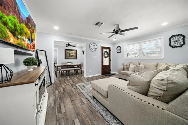 a view of living room with furniture and window