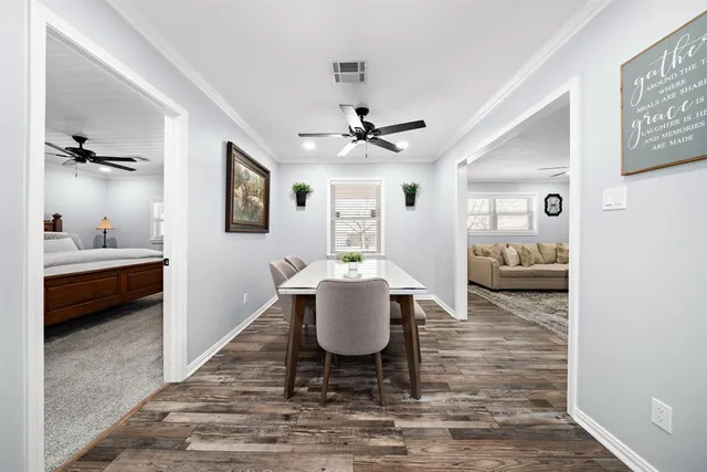 a kitchen with stainless steel appliances a refrigerator sink and stove