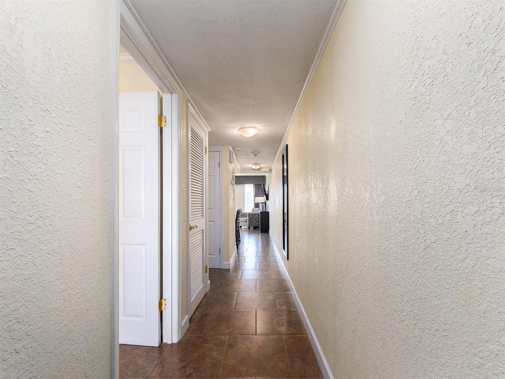 2506 North Rocky Point Drive, Unit 358 Tampa, FL 33607 - Photo 13 of 45 a view of hallway with wooden floor