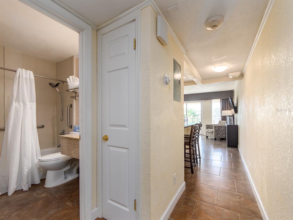 2506 North Rocky Point Drive, Unit 358 Tampa, FL 33607 - Photo 14 of 45 a bathroom with a toilet and a shower