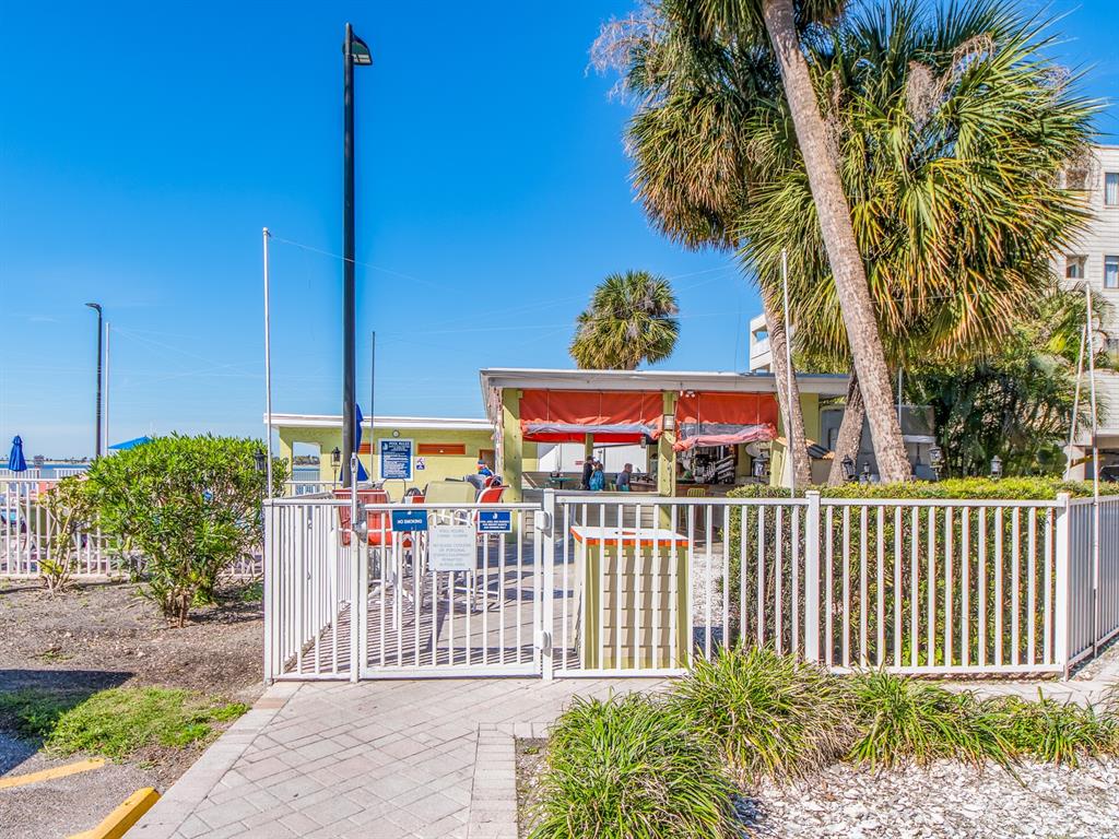 2506 North Rocky Point Drive, Unit 358 Tampa, FL 33607 - Photo 30 of 45 a view of a house with a fence