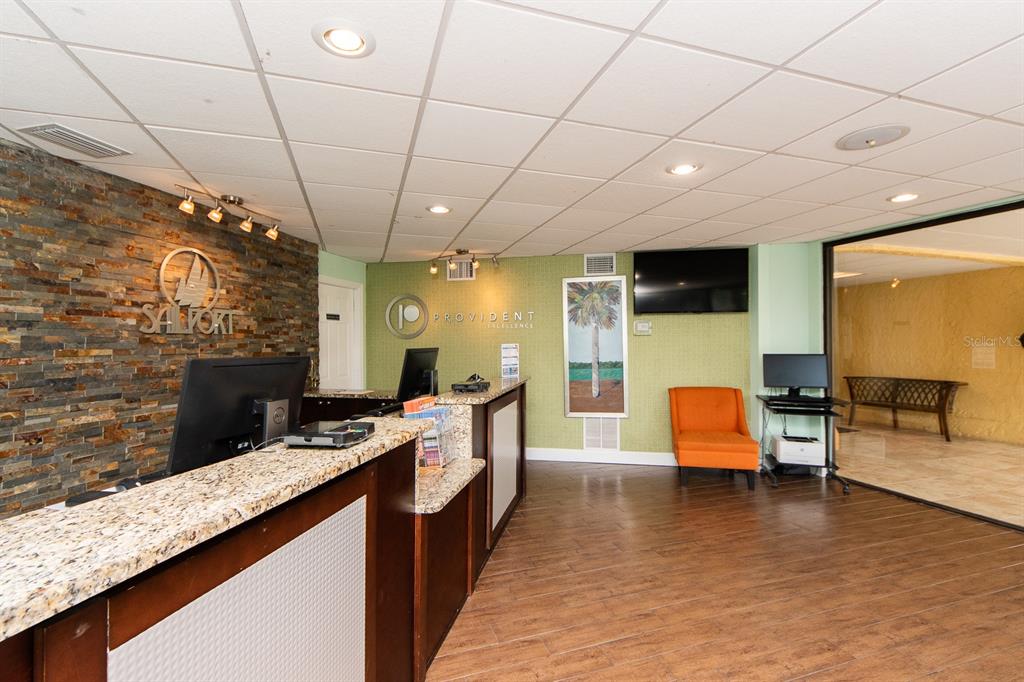 2506 North Rocky Point Drive, Unit 358 Tampa, FL 33607 - Photo 44 of 45 a kitchen with stainless steel appliances granite countertop a sink and cabinets