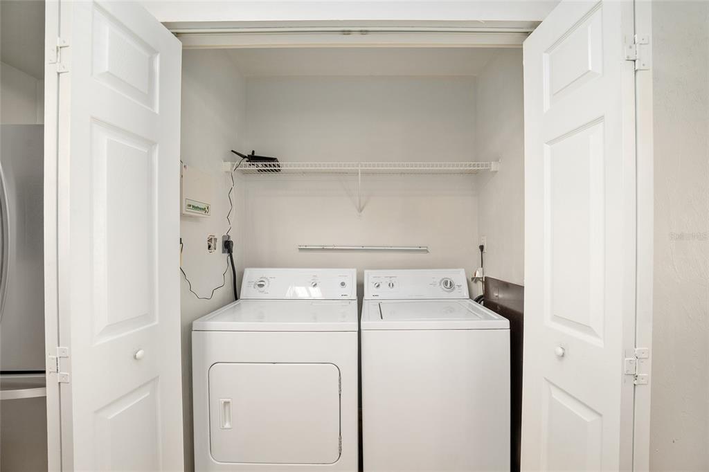 3910 Southwest 20th Avenue, Unit 1403 Gainesville, FL 32607 - Photo 20 of 36 a utility room with dryer and washer