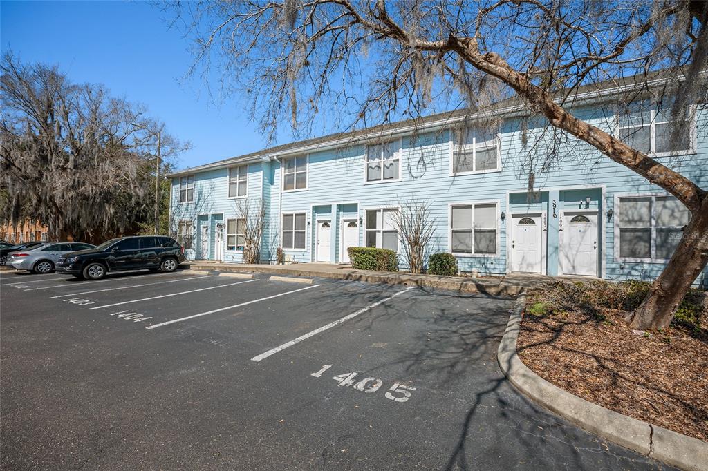 3910 Southwest 20th Avenue, Unit 1403 Gainesville, FL 32607 - Photo 35 of 36 a view of a house with a patio