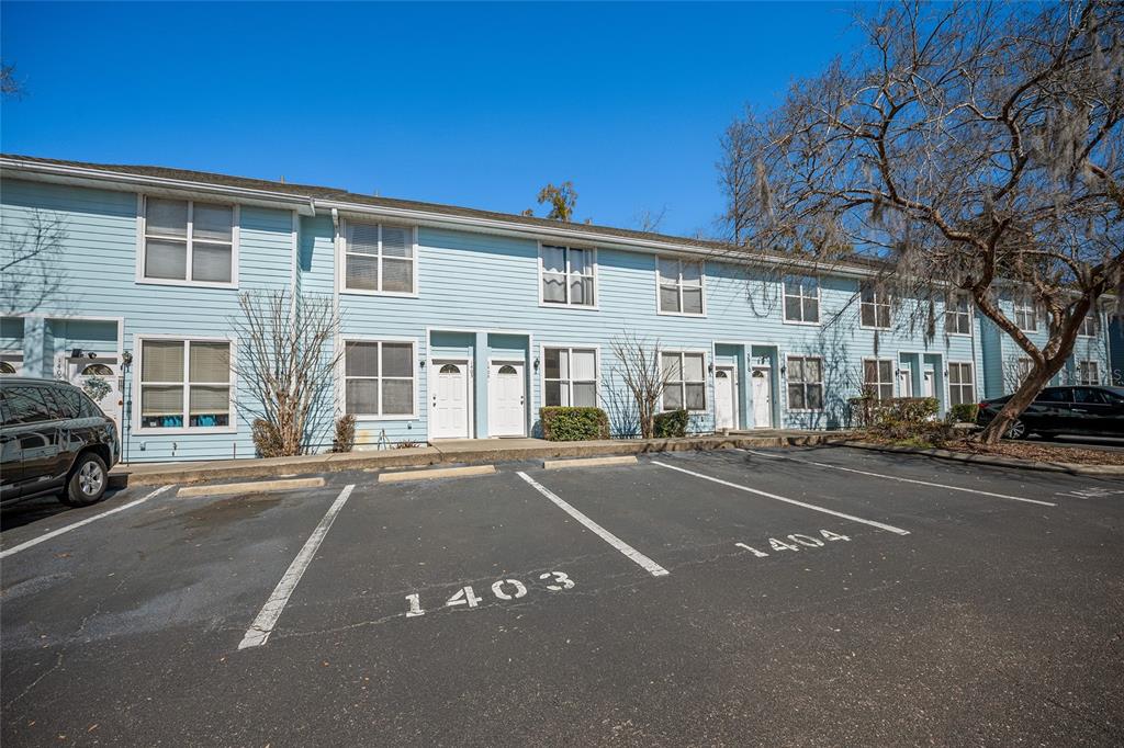 3910 Southwest 20th Avenue, Unit 1403 Gainesville, FL 32607 - Photo 6 of 36 a view of a building with a street