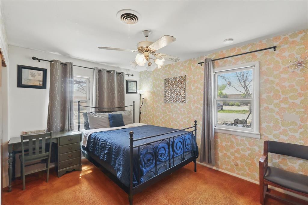 1509 Tinker Road Colleyville, TX 76034 - Photo 18 of 18 a bedroom with a bed and a table in it