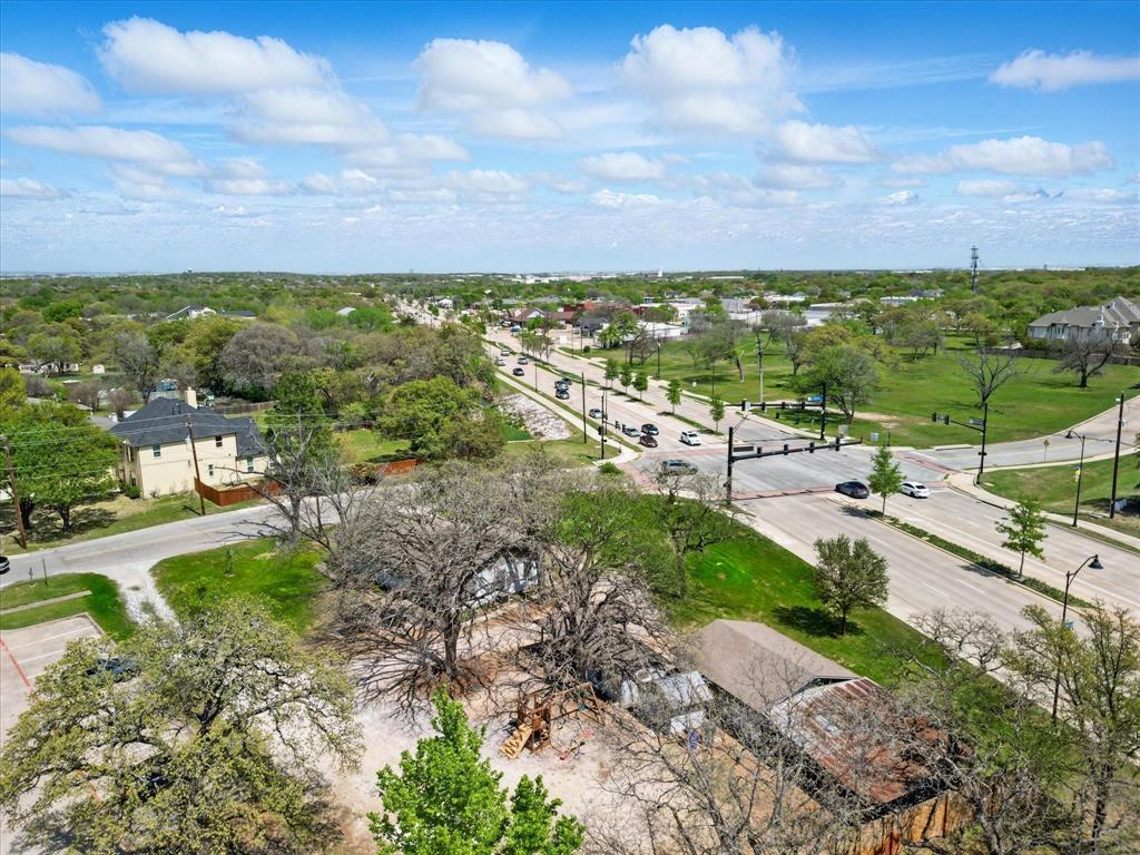 1509 Tinker Road Colleyville, TX 76034 - Photo 6 of 18 a view of a lake with a building in the background