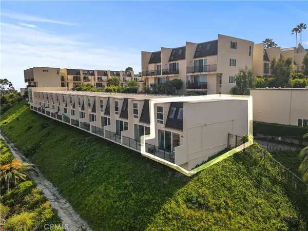 a view of a balcony with city view