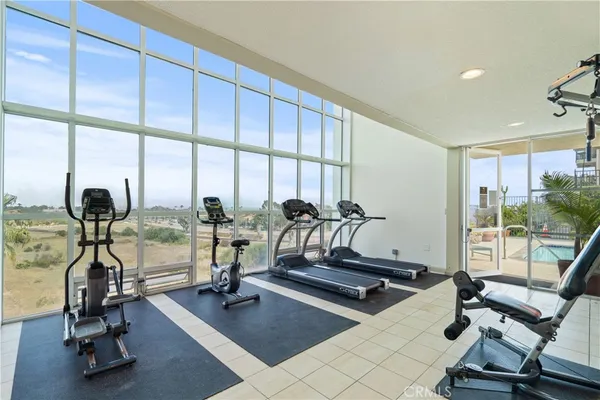 a view of a room with gym equipment