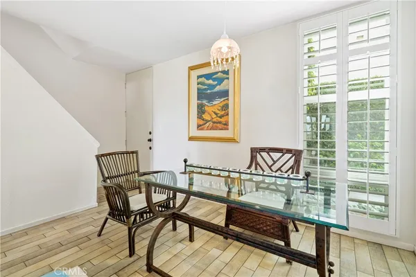 a view of a room with furniture next to a window