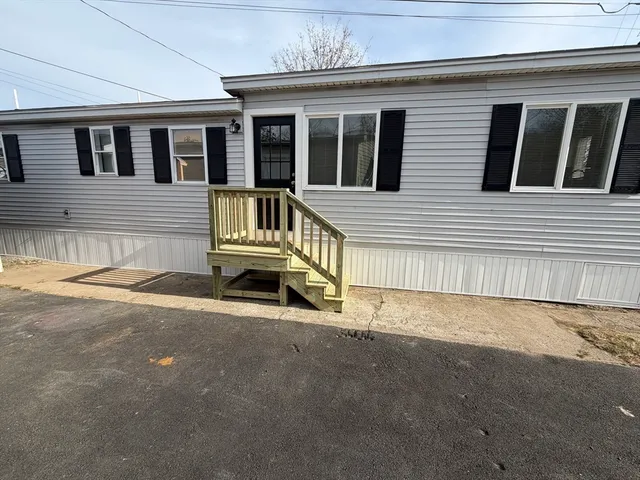 a view of outdoor space with garden and deck