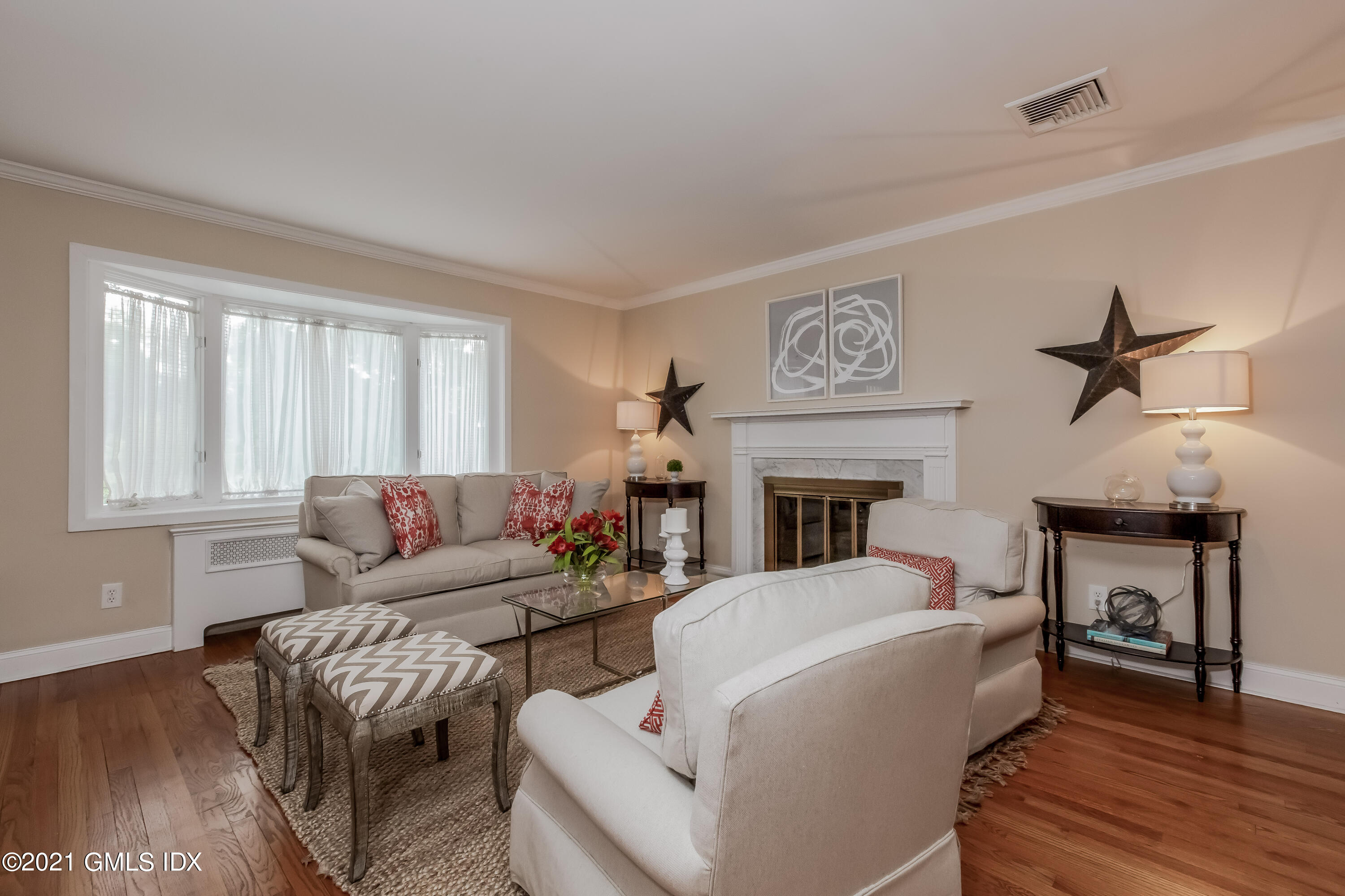 14 Summit Road Riverside, CT 06878 - Photo 8 of 46 a living room with furniture a fireplace and a flat screen tv