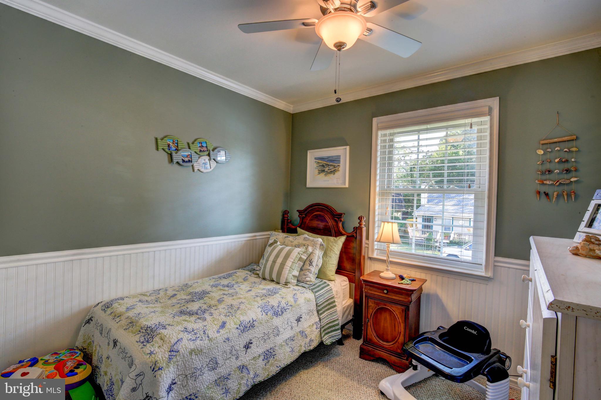 1510 Bishop Road Edgewater, MD 21037 - Photo 13 of 34 Upstairs bedroom with wainscoting & crown molding