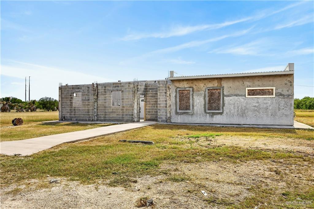 1424 North Sky Soldier Road Weslaco, TX 78596 - Photo 5 of 33 a view of a terrace with a ocean view