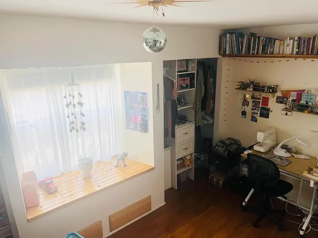 a bathroom with a tub and a view of bathroom