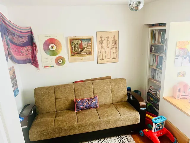 a living room with furniture and a couch