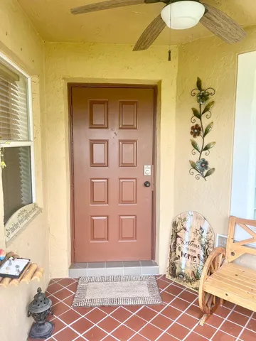 a front view of a house with a chandelier