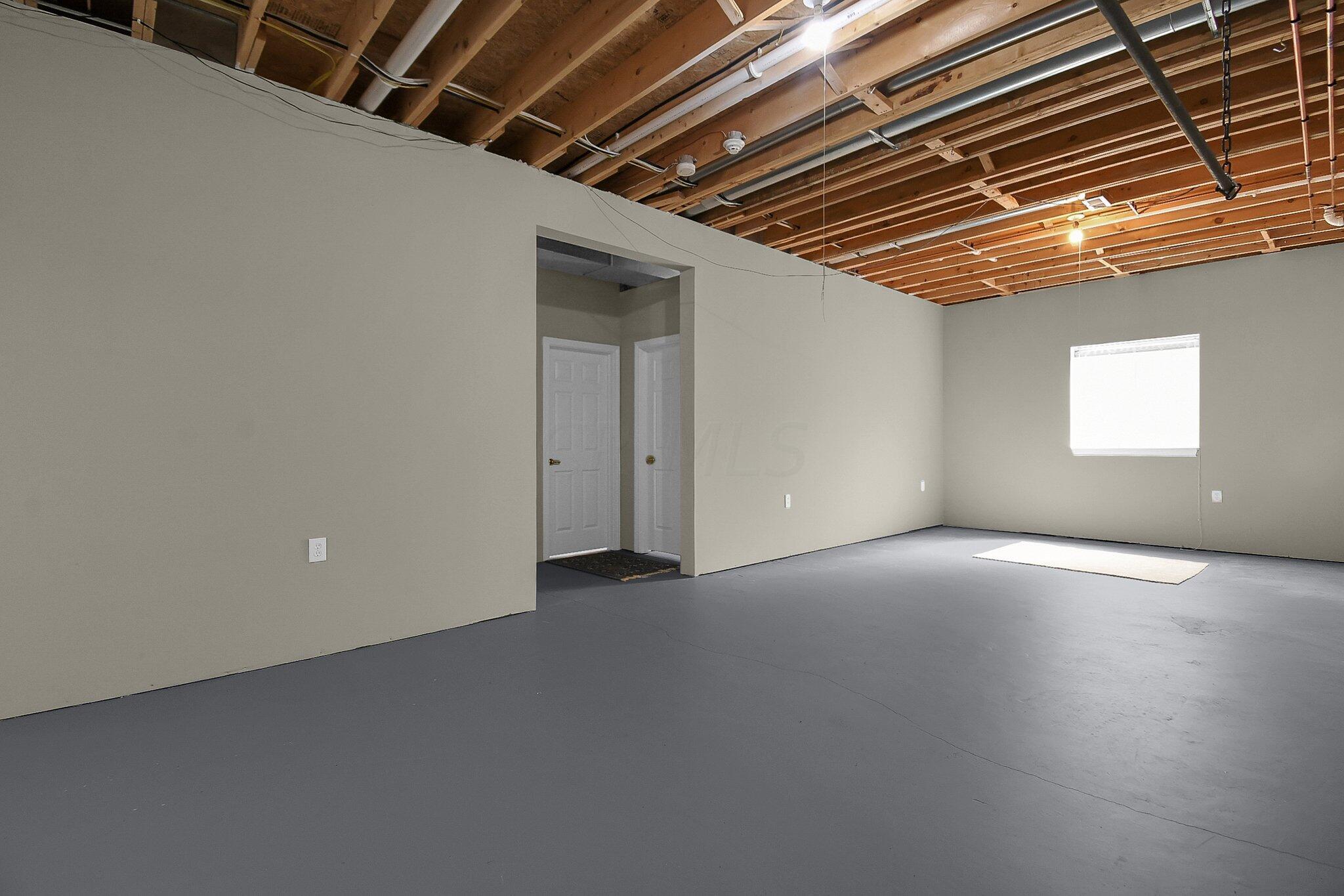 15125 Smart-Cole Road Ostrander, OH 43061 - Photo 38 of 63 Basement living area with egress