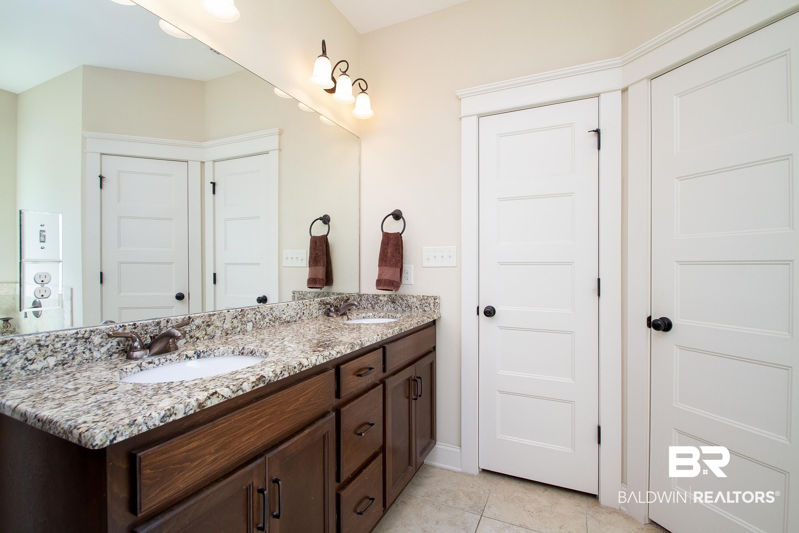 8625 Rosedown Lane Daphne, AL 36526 - Photo 15 of 29 Bathroom featuring tile patterned flooring and vanity